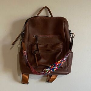 Brown Leather Backpack with Colorful Strap